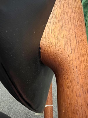 Lot 316 - A Danish teak and vinyl chair