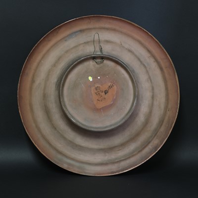 Lot 75 - A Rozenburg glazed earthenware wall charger