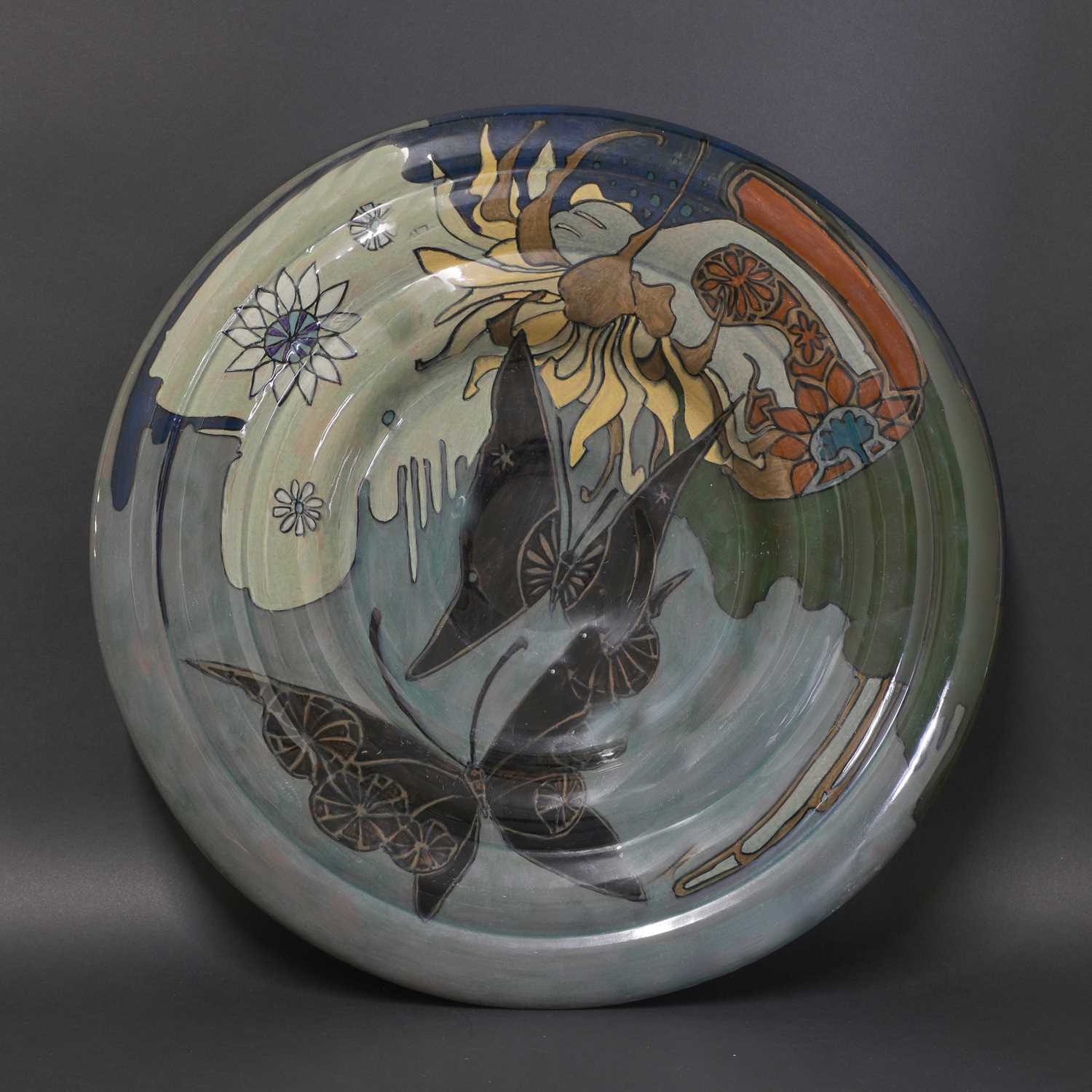 Lot 75 - A Rozenburg glazed earthenware wall charger