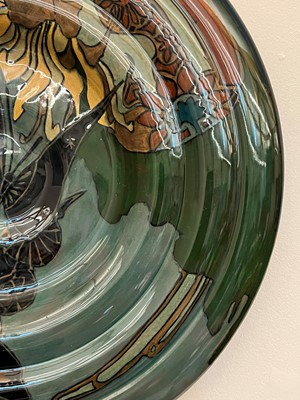 Lot 75 - A Rozenburg glazed earthenware wall charger