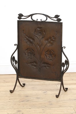 Lot 57 - An Arts and Crafts copper embossed fire screen