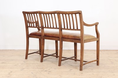 Lot 33 - A Cotswold School oak chair-back settee