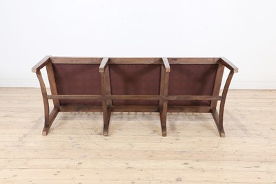 Lot 33 - A Cotswold School oak chair-back settee