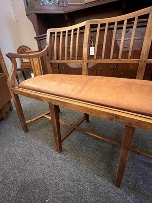 Lot 33 - A Cotswold School oak chair-back settee