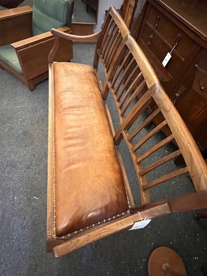 Lot 33 - A Cotswold School oak chair-back settee
