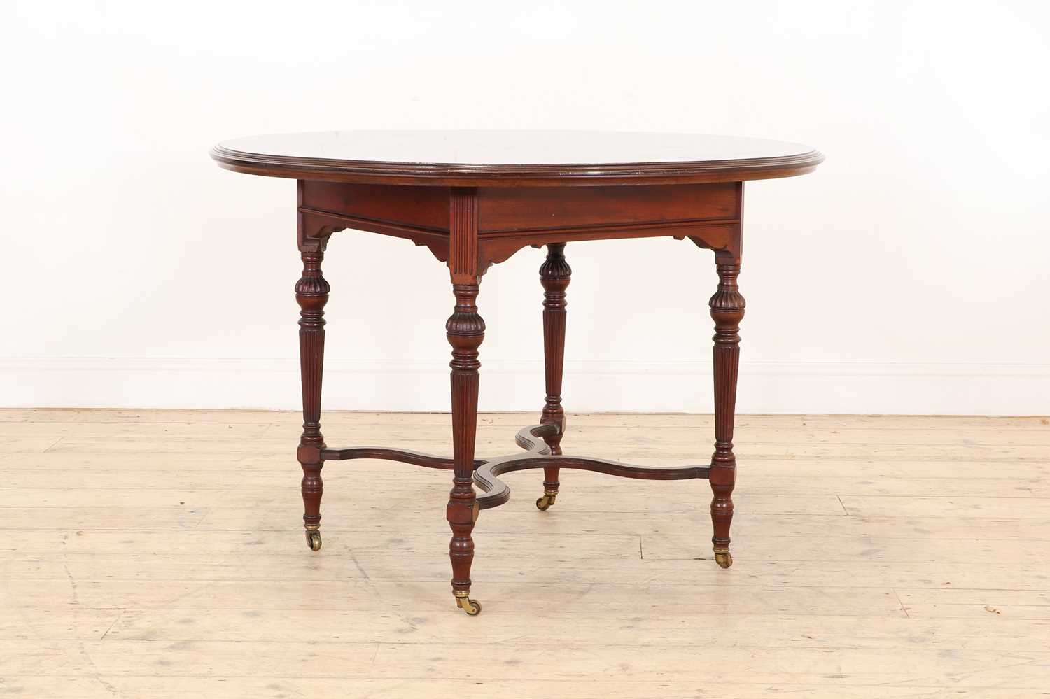 Lot 10 - An Aesthetic Movement mahogany centre table