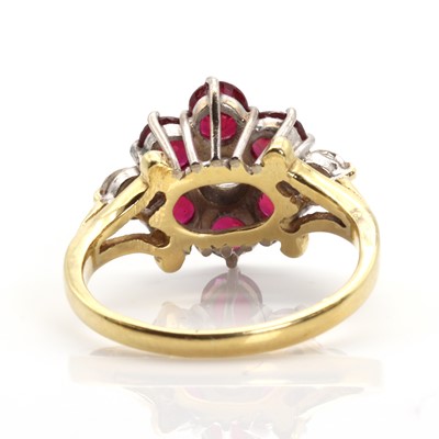 Lot 391 - A diamond and ruby cluster ring