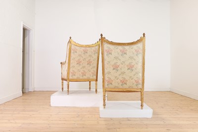 Lot 174 - A pair of French giltwood bergère armchairs