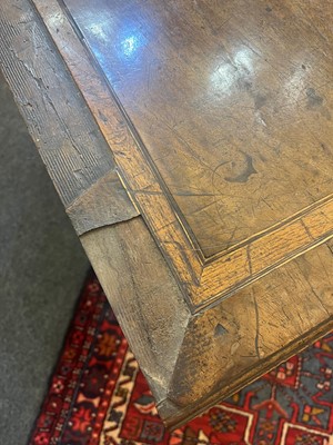 Lot 55 - A walnut lowboy