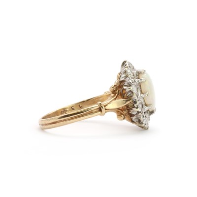 Lot 145 - A 9ct white gold opal and diamond cluster ring