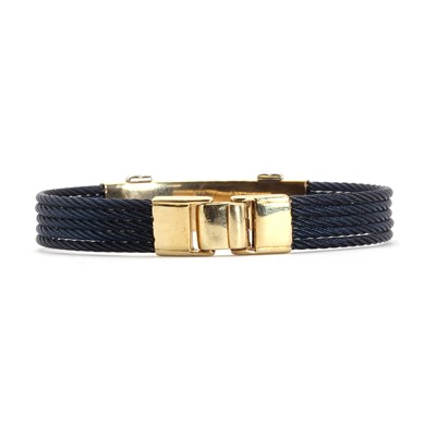 Lot 101 - A two colour gold cable bangle