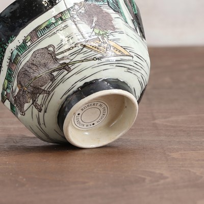 Lot 34 - A Chinese famille noire cup