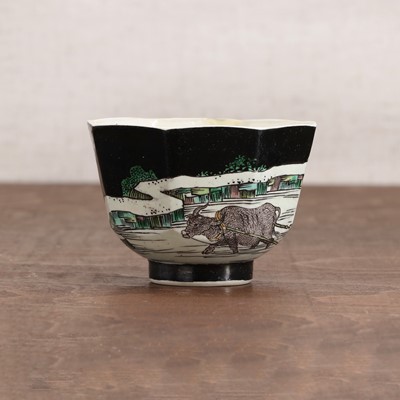 Lot 34 - A Chinese famille noire cup