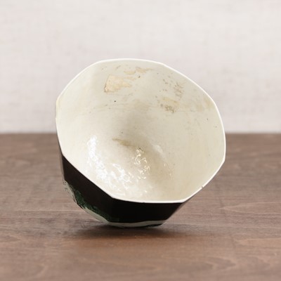 Lot 34 - A Chinese famille noire cup
