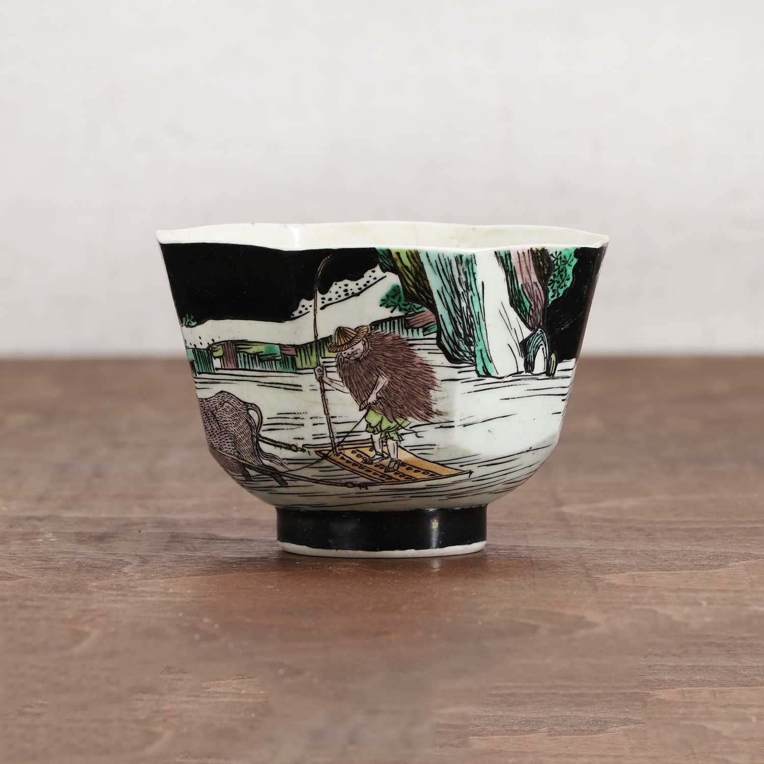 Lot 34 - A Chinese famille noire cup