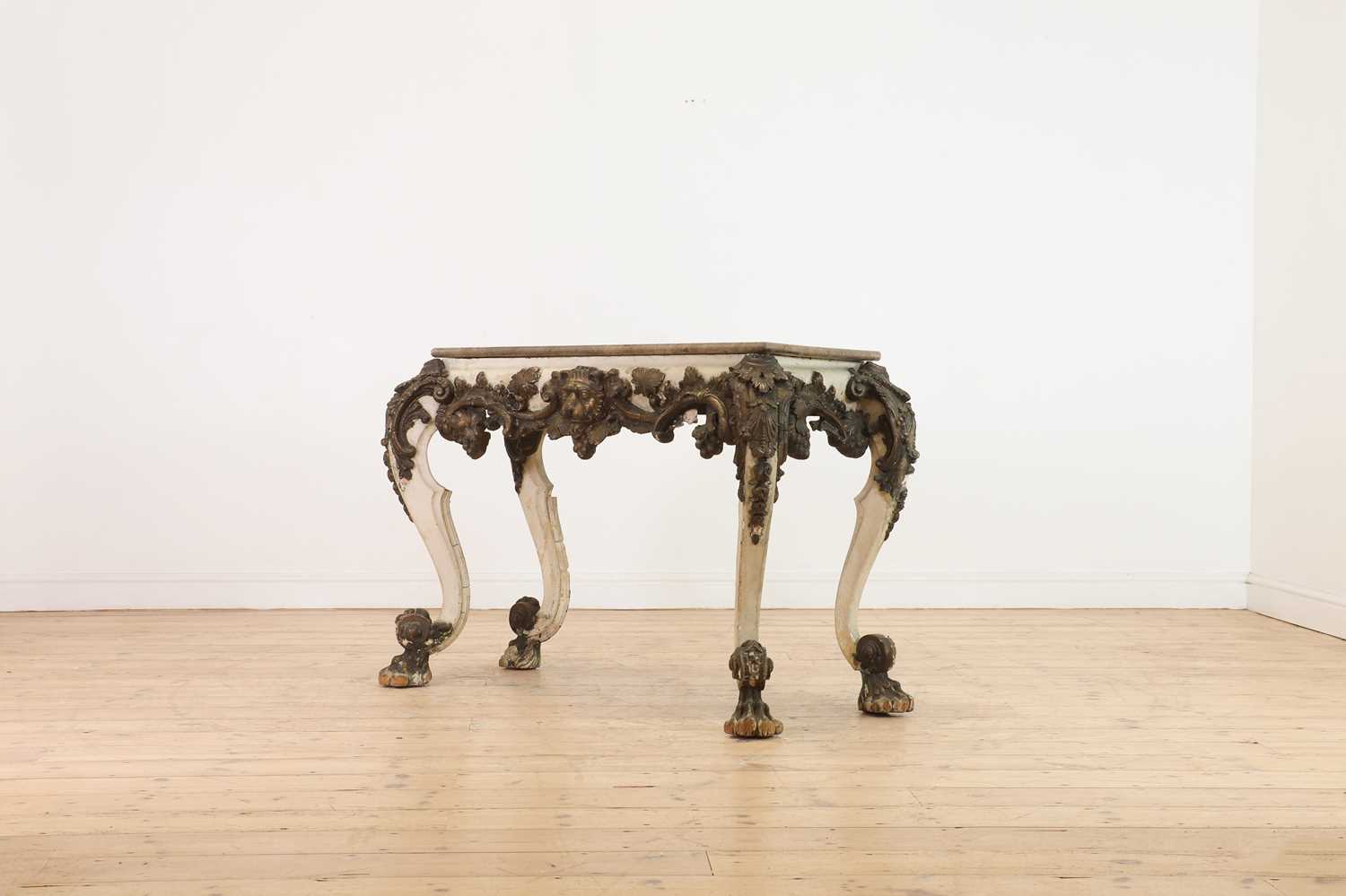 Lot 173 - A carved and painted wood and composition pier table