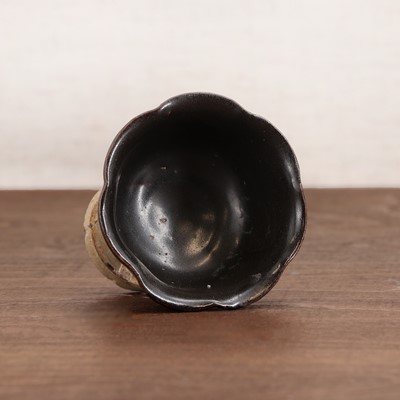 Lot 17 - A Chinese stoneware stem cup