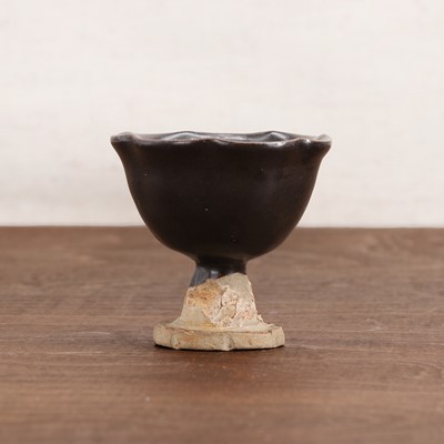 Lot 17 - A Chinese stoneware stem cup