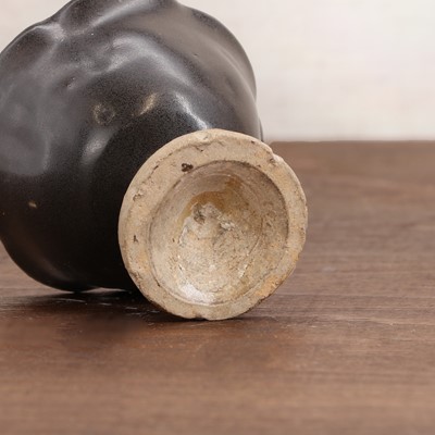 Lot 17 - A Chinese stoneware stem cup