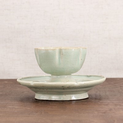 Lot 46 - A Korean celadon stem cup and stand