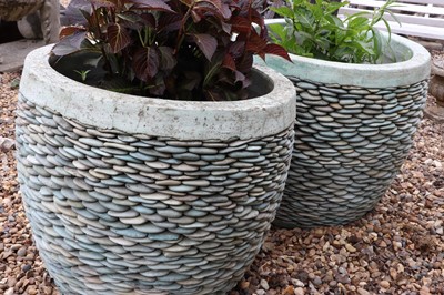 Lot 510 - A pair of pebble stone garden planters