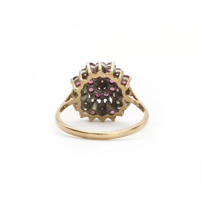 Lot 85 - A 9ct gold ruby and diamond cluster ring