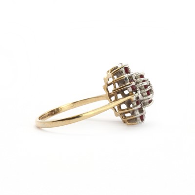 Lot 85 - A 9ct gold ruby and diamond cluster ring