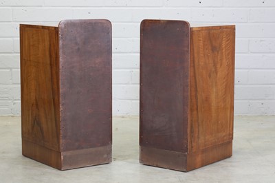 Lot 210 - A pair of Art Deco walnut bedside tables