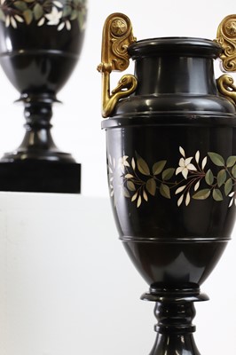 Lot 234 - A pair of Ashford black marble urns