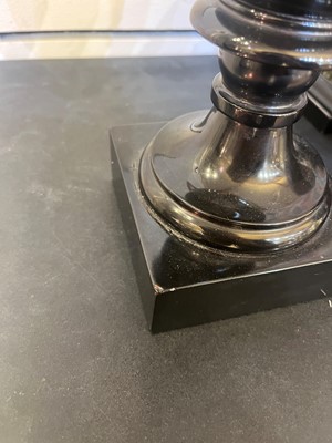 Lot 234 - A pair of Ashford black marble urns