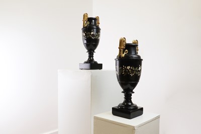Lot 234 - A pair of Ashford black marble urns