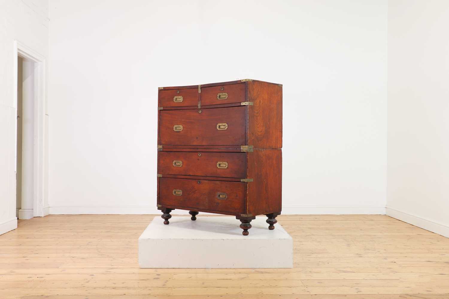 Lot 142 - A teak campaign chest
