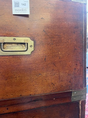 Lot 142 - A teak campaign chest