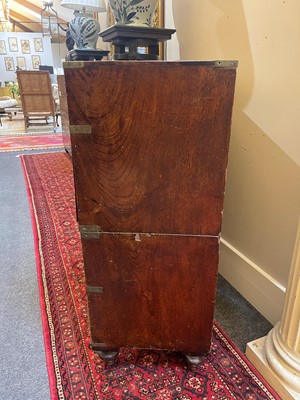 Lot 142 - A teak campaign chest