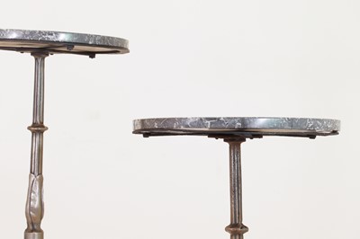 Lot 276 - A pair of marble and polished cast iron bistro tables