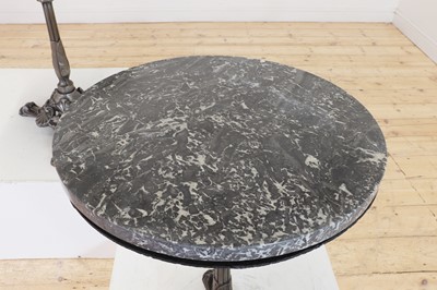 Lot 276 - A pair of marble and polished cast iron bistro tables