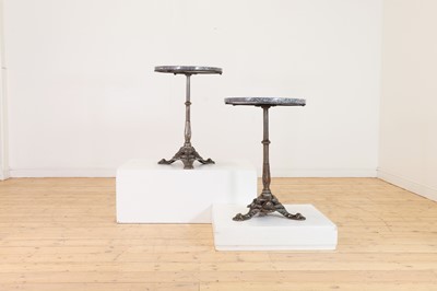 Lot 276 - A pair of marble and polished cast iron bistro tables