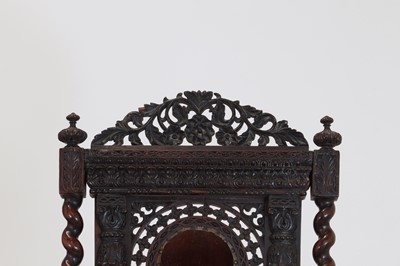 Lot 147 - A near pair of carved rosewood occasional chairs
