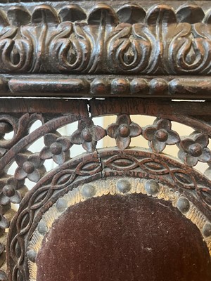 Lot 147 - A near pair of carved rosewood occasional chairs