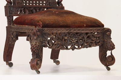 Lot 147 - A near pair of carved rosewood occasional chairs