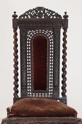 Lot 147 - A near pair of carved rosewood occasional chairs