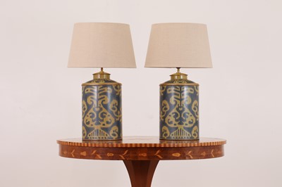 Lot 176 - A pair of toleware table lamps