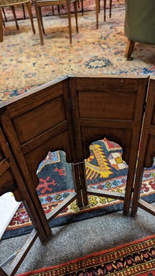 Lot 134 - A teak and brass octagonal occasional table