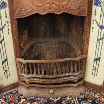 Lot 5 - An Art Nouveau cast iron fire surround