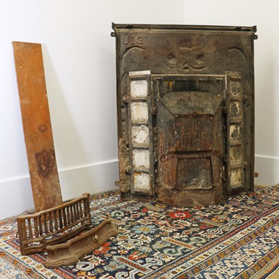Lot 5 - An Art Nouveau cast iron fire surround