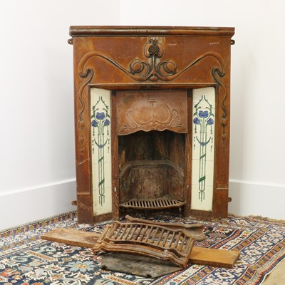Lot 5 - An Art Nouveau cast iron fire surround
