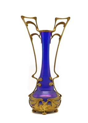 Lot 226 - A Bohemian gilt metal mounted iridescent glass vase