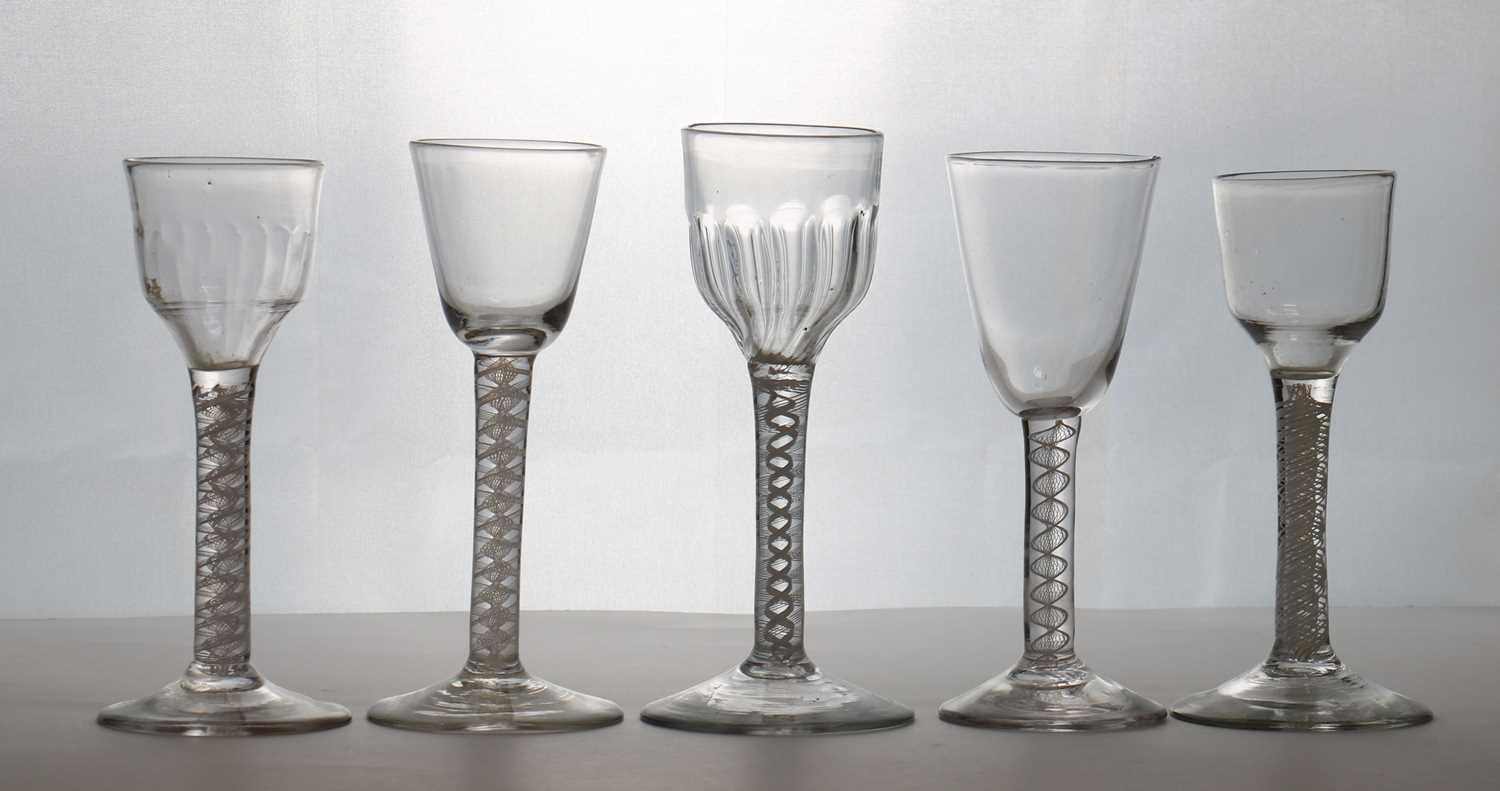 Lot 188 - A group of five opaque twist wine glasses