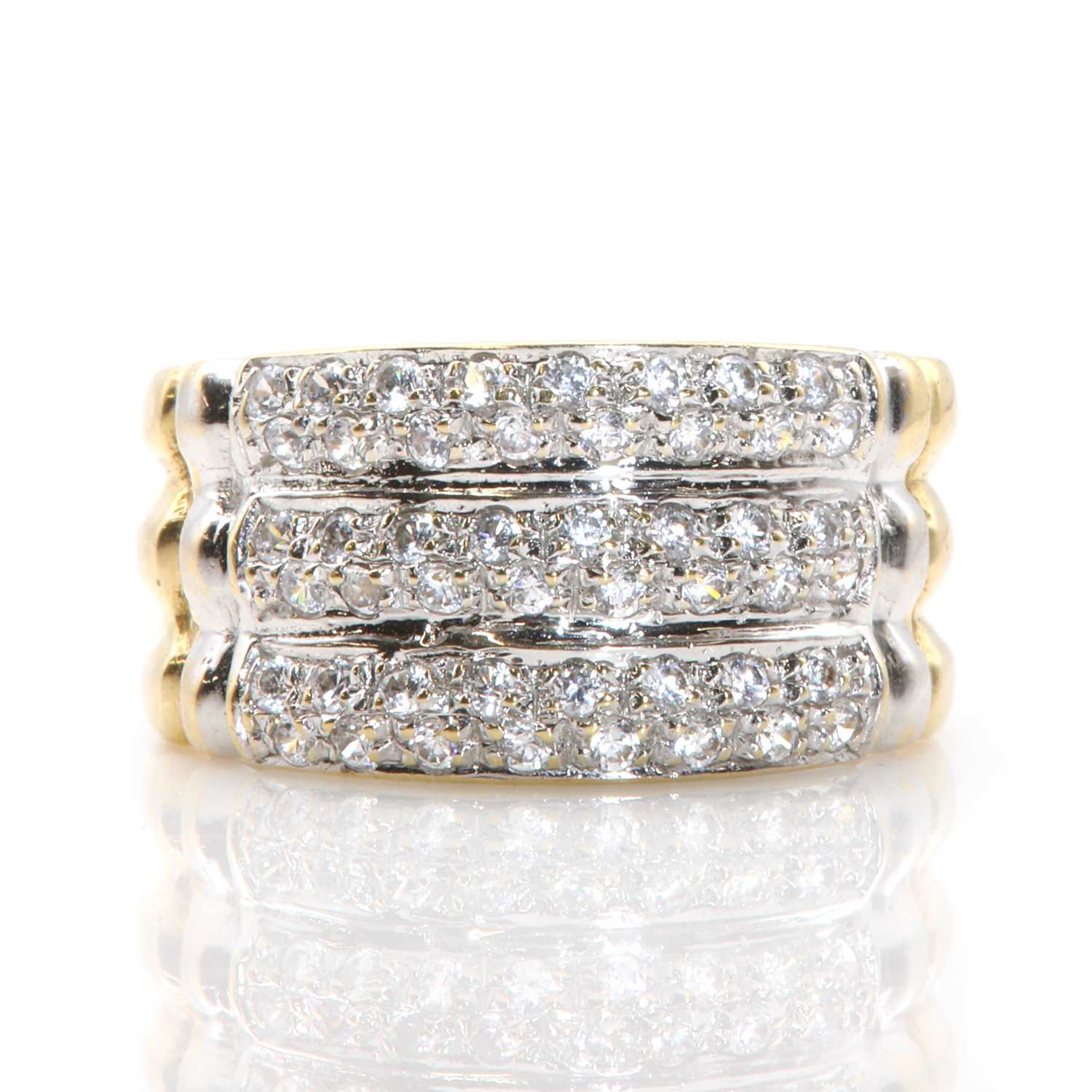 Lot 88 - An 18ct gold and cubic zirconia dress ring