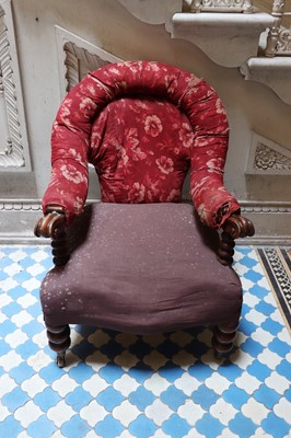Lot 29 - A Victorian walnut-framed horseshoe-back library chair